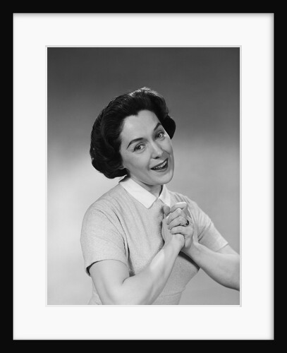 Brunette woman smiling happy satisfied proudly clasping hands to chest by Anonymous