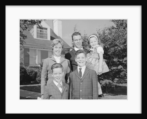 Family portrait father mother two sons and daughter in front of suburban house by Anonymous