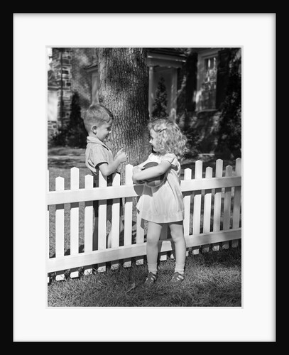 Boy girl holding ball talking flirting over white picket fence neighbors by Anonymous