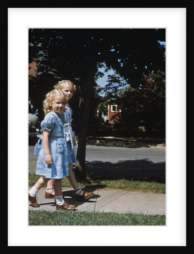 Two blond girls wearing blue dresses on the first day of school by Anonymous