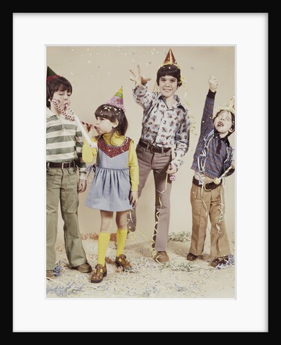 4 kids wearing party hats tossing confetti by Anonymous