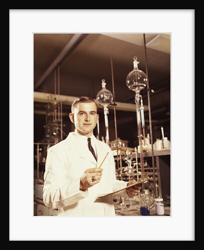 Scientist conducting a titration experiment by Anonymous