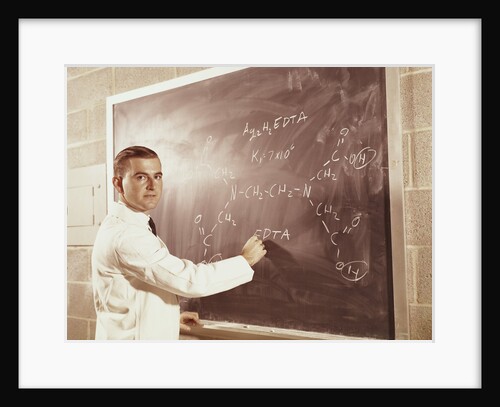 Science professor writing a formula for chelating agent on chalkboard by Anonymous