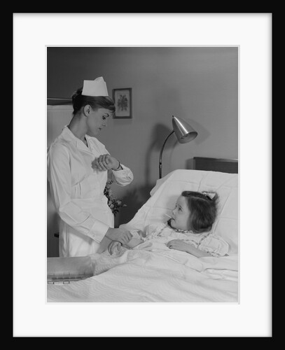 Woman nurse checking pulse taking temperature on little girl patient in hospital bed by Anonymous