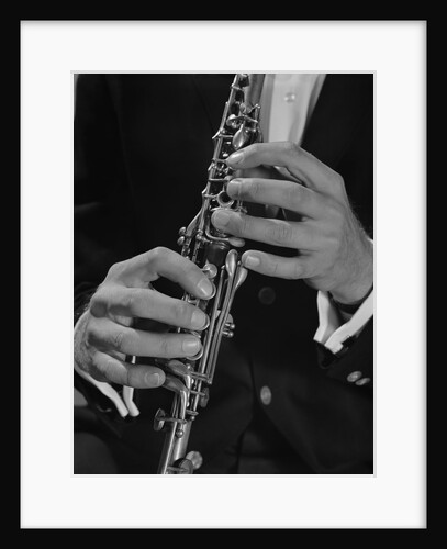 Male hands playing clarinet by Anonymous