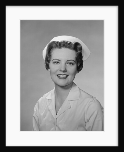 Portrait female nurse smiling by Anonymous