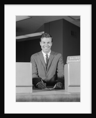 Smiling man bank teller savings accounts sign on counter by Anonymous