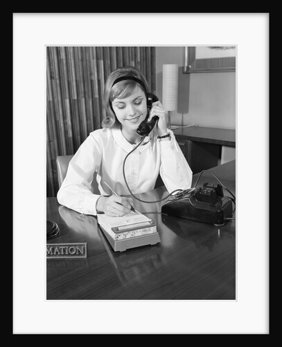 Secretary receptionist talking on telephone writing into desk calendar by Anonymous