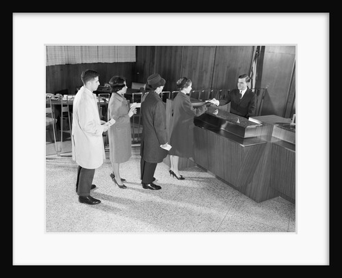 People waiting in line for bank teller by Anonymous
