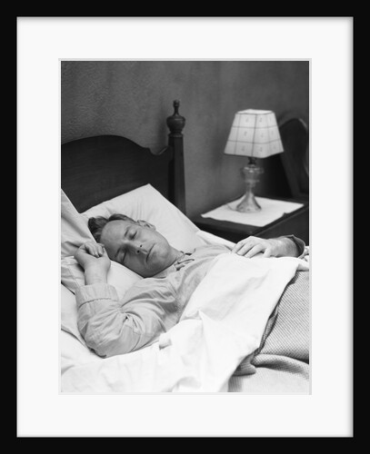 Man sleeping asleep in bedroom by Anonymous