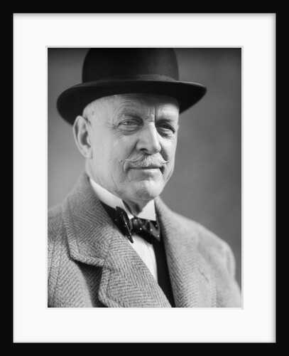 Portrait of older man with a mustache wearing a bowler hat and bow tie by Anonymous