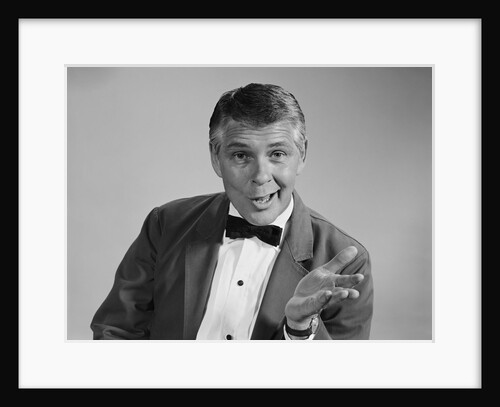 Portrait man wearing bow tie quizzical facial expression & gesture by Anonymous