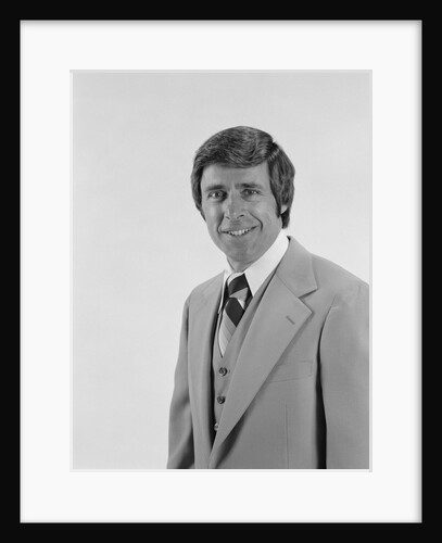 Smiling portrait business man three piece suit with vest by Anonymous