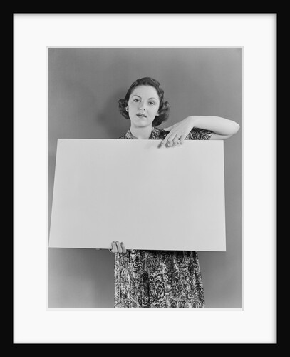 Woman holding blank poster sign hand pointing from top by Anonymous