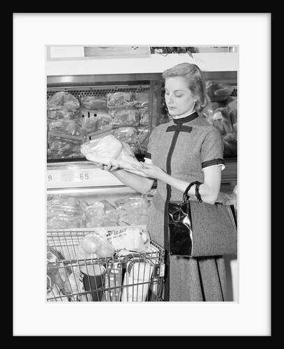 Blond woman selecting poultry in supermarket by Anonymous