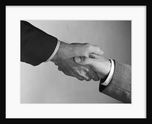 Male handshake close-up of hands by Anonymous