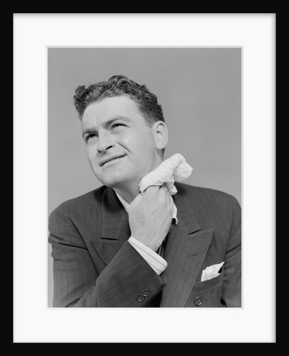 Man uncomfortable grimace sweating wiping neck with handkerchief by Anonymous