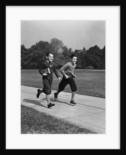 Two smiling boys running carrying school books by Anonymous