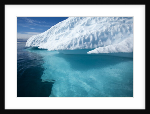 Iceberg above and below water in Disko Bay in Greenland by Anonymous