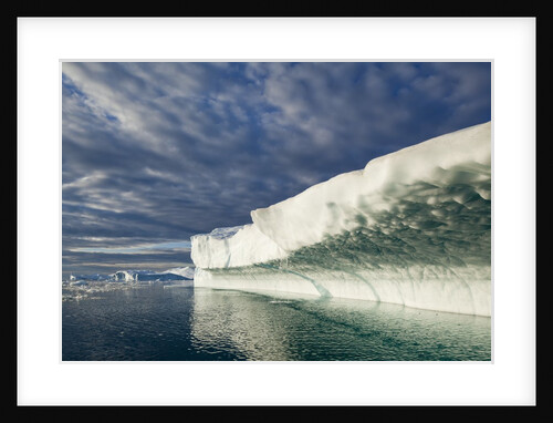 Melting iceberg in Disko Bay in Greenland by Anonymous
