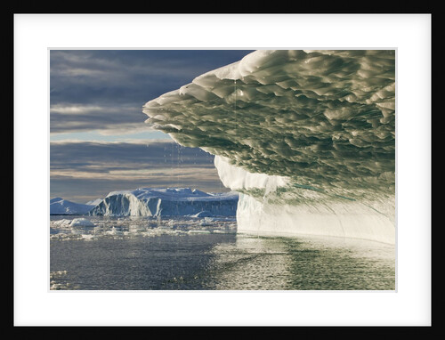 Iceberg melting in Disko Bay in Greenland by Anonymous