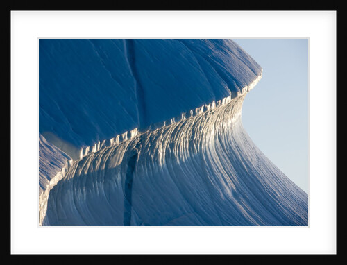 Melting iceberg in Disko Bay in Greenland by Anonymous