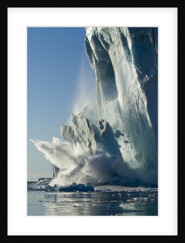 Calving iceberg in Disko Bay in Greenland by Anonymous