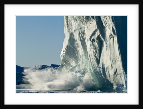 Calving iceberg in Disko Bay in Greenland by Anonymous