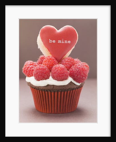 Chocolate cupcake with raspberries & heart-shaped biscuit by Anonymous