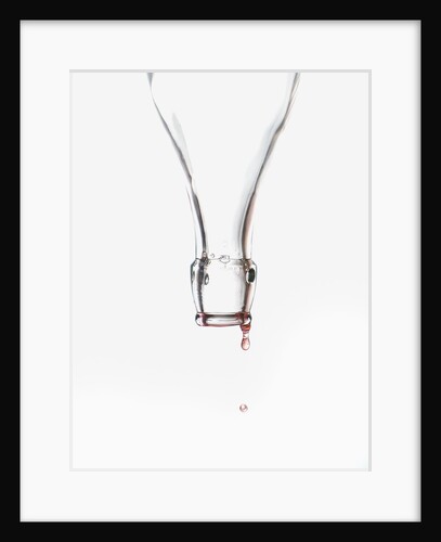 Liquid pouring out of empty bottle by Anonymous