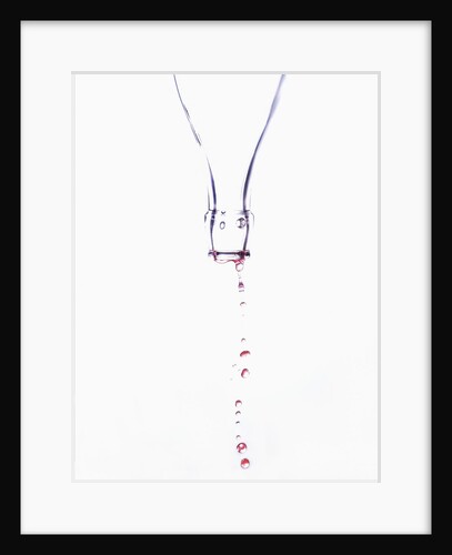 Liquid pouring out of empty bottle by Anonymous