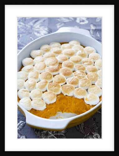 Sweet potatoes with marshmallows in baking dish by Anonymous