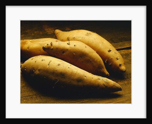 Yams on Wooden Table by Anonymous