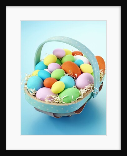 Small trug of coloured eggs by Anonymous