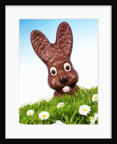 Chocolate Easter Bunny in Easter grass by Anonymous