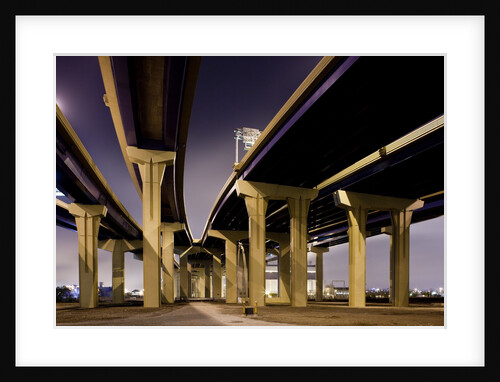 Highway overpasses at night by Anonymous