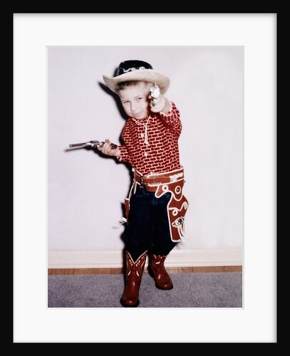 Little cowboy fires play six shooters, ca. 1956 by Anonymous