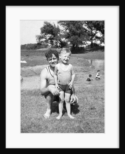 Father with young son at water hole, ca. 1930 by Anonymous