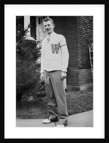 High school boy wearing his varsity sweater, ca. 1945 by Anonymous
