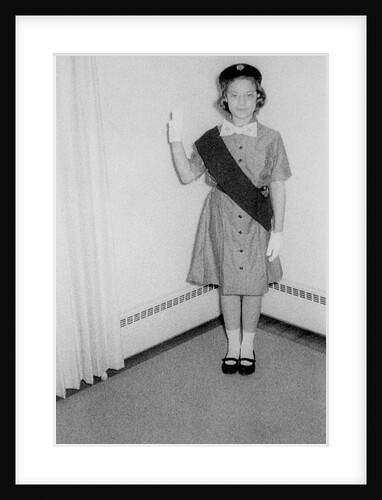 Young girl scout makes oath and pledge, ca. 1963 by Anonymous