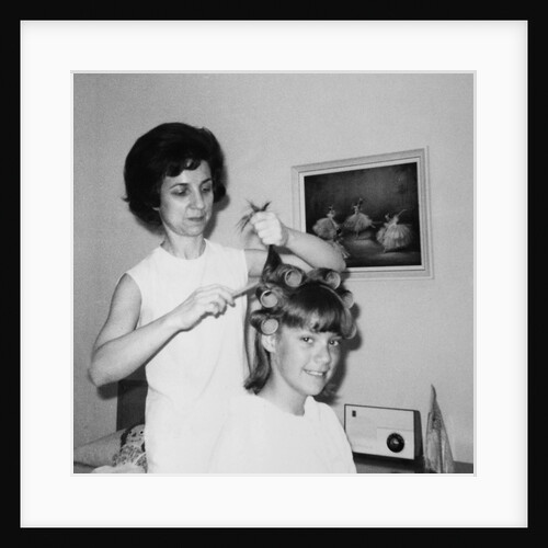 Mother helps 16 year old daughter get ready for date, ca. 1970 by Anonymous