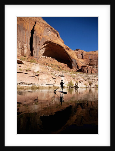 Stand-up paddleboarding on Lake Powell, Utah by Anonymous