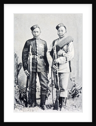 Postcard showing two Gurkha soldiers c 1900. They are shown with their service rifles and medals. The man on the left is a seargant. by Anonymous