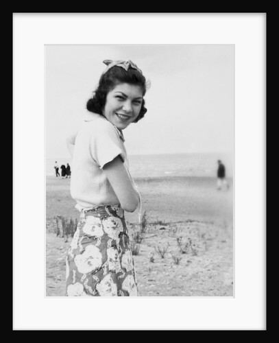 Happy young woman at the beach, ca. 1938 by Anonymous
