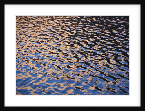 Reflection of red rock on Lake Powell at sunset by Anonymous