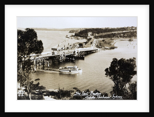 Sydney Spit Bridge, Middle Harbour, Sydney, New South Wales, Australia in 1924. The bridge shown is a wooden lifting bridge. On the road, there are cars of the period. by Anonymous