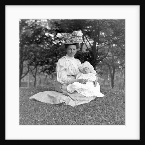 OIder woman and baby in a English park, ca. 1900. by Anonymous