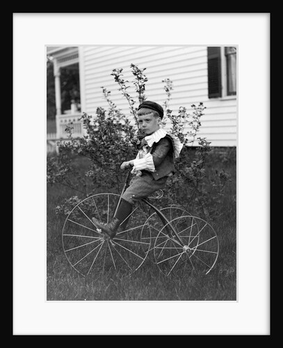 Toddler on a period tricycle, ca. 1895. by Anonymous