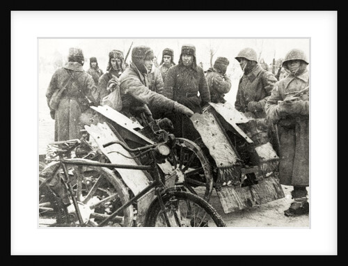 Russian soldiers with two captured German I.G.18 infantry support guns by Anonymous