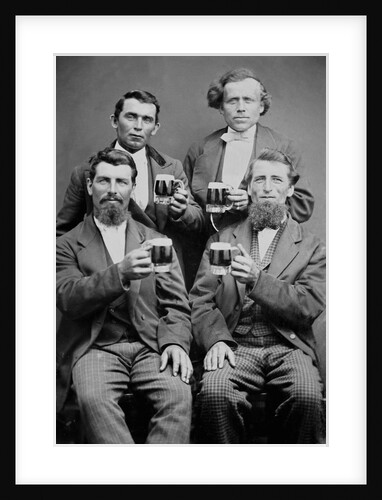 Four guys and their mugs of beer, ca. 1880. by Anonymous